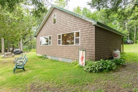 The cabin has a grandfathered location just 50 feet from the waters edge. . Camp for sale maine